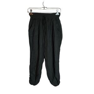 Rewash dark green pull on pants. Size small
